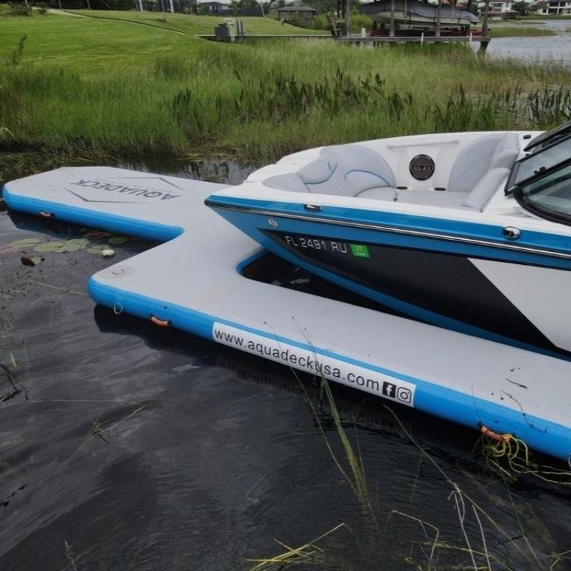 Aquadeck Inflatable U Pontoon floating in lake side view