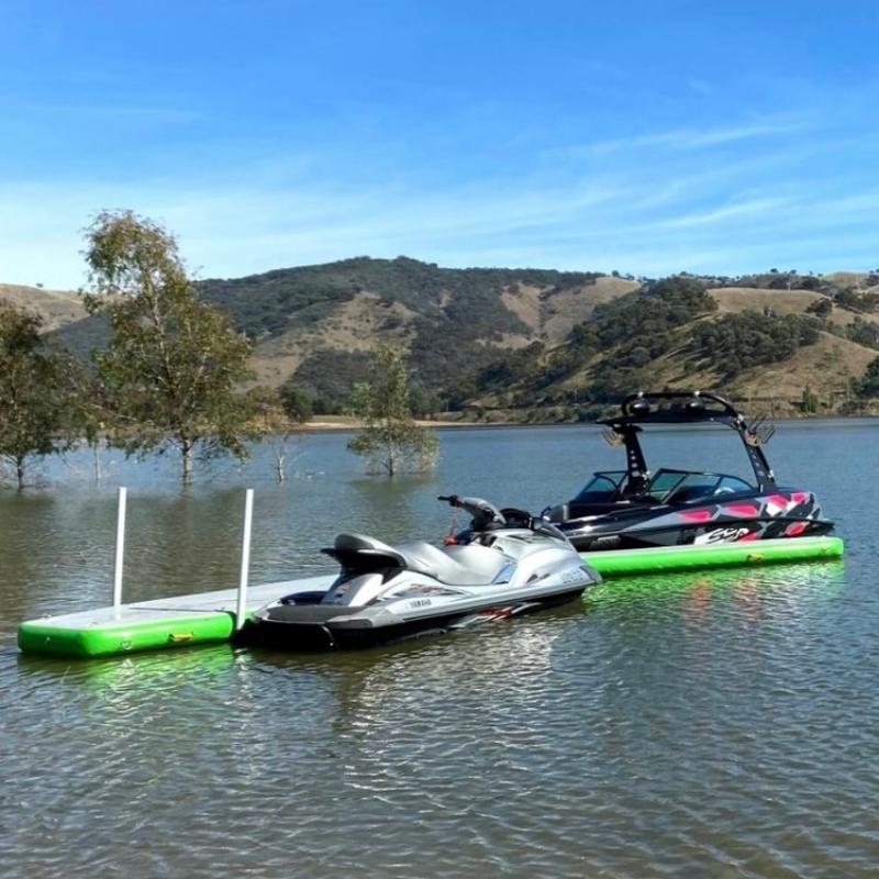 Aquadeck inflatable Y pontoon featuring blue design with boat on water