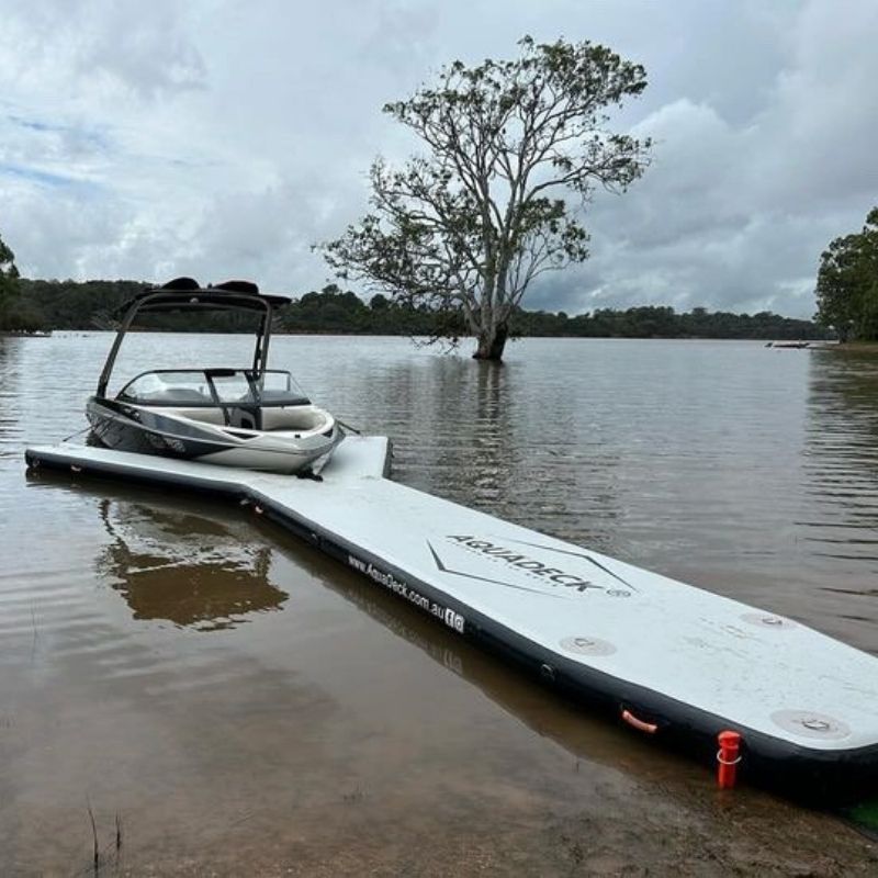 Aquadeck Inflatable Y Pontoon docking two boats in water