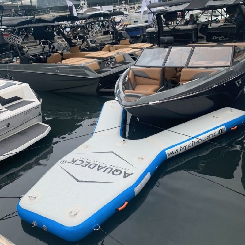 Aquadeck Inflatable Y Pontoon setup in a marina for docking