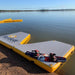 Bartlett 4m X 2m V Deck inflatable pontoon floating on calm lake with wakeboard resting on deck