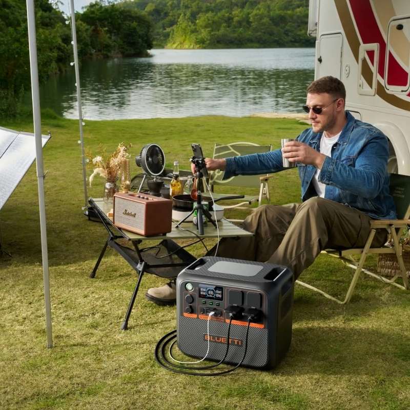 bluetti ac200pl in outdoor camping setting providing portable power