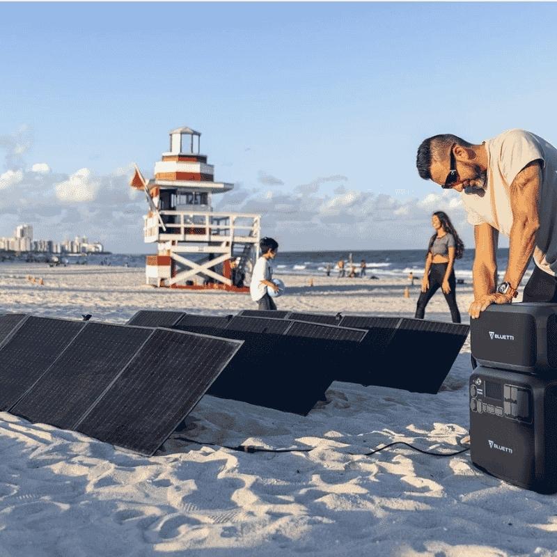 Bluetti PV120 solar panel setup providing power on the beach