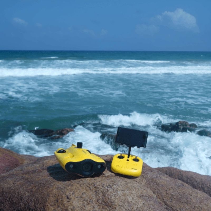 Chasing Gladius Mini S underwater drone placed near the ocean