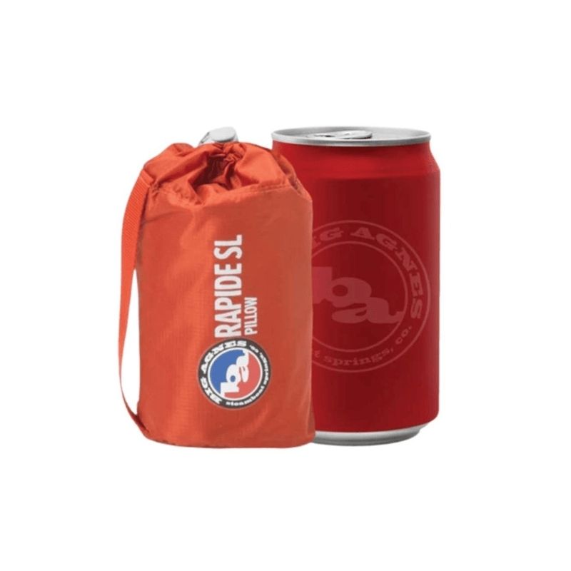 Compact inflatable pillow from Compact Co. 4-Person Elite Camping Set next to a soda can for size comparison