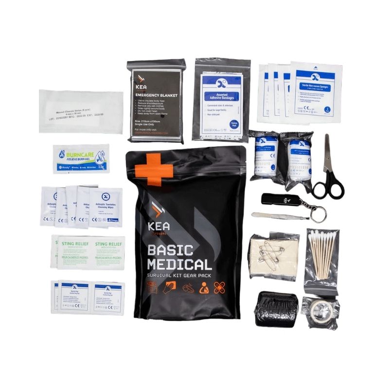 Compact Co. 4-Person Elite Camping Set medical survival kit contents displayed, including emergency blanket, bandages, and scissors