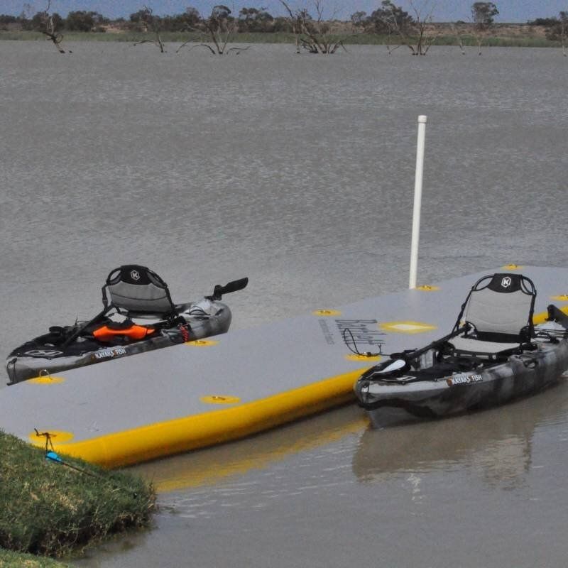 Kayaks docked on Bartlett Straight Inflatable Pontoon in water