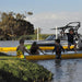 Kids playing on Bartlett Straight Inflatable Pontoon by the water