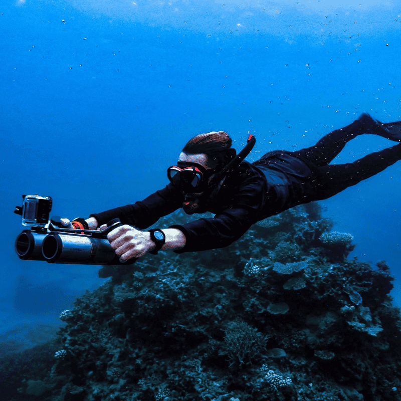 LEFEET P1 diver using underwater scooter coral reef