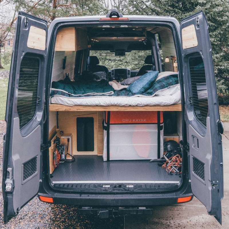 Oru Beach LT kayak packed compactly in a van for a road trip