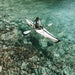 Oru Kayak Bay St gliding over crystal clear water