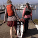 Oru Kayak Haven TT packed and carried to the water by two people