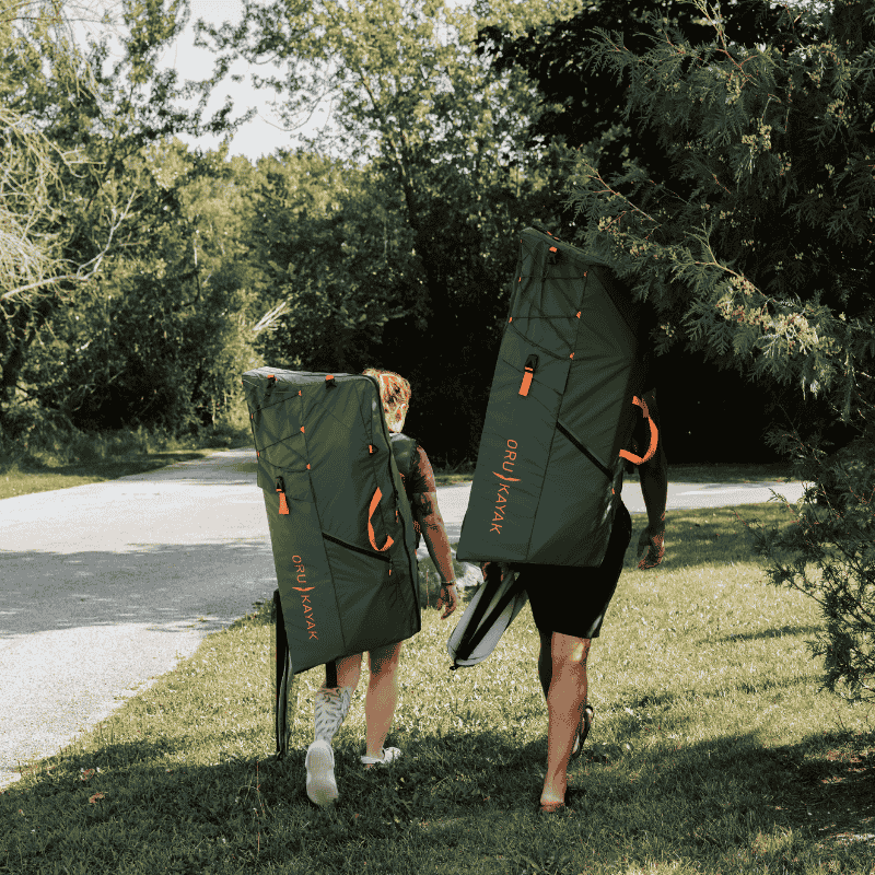 Oru Lake + kayak being carried in a backpack, highlighting portability and foldability