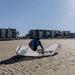 Oru Lake+ folding kayak setup on a sandy beach