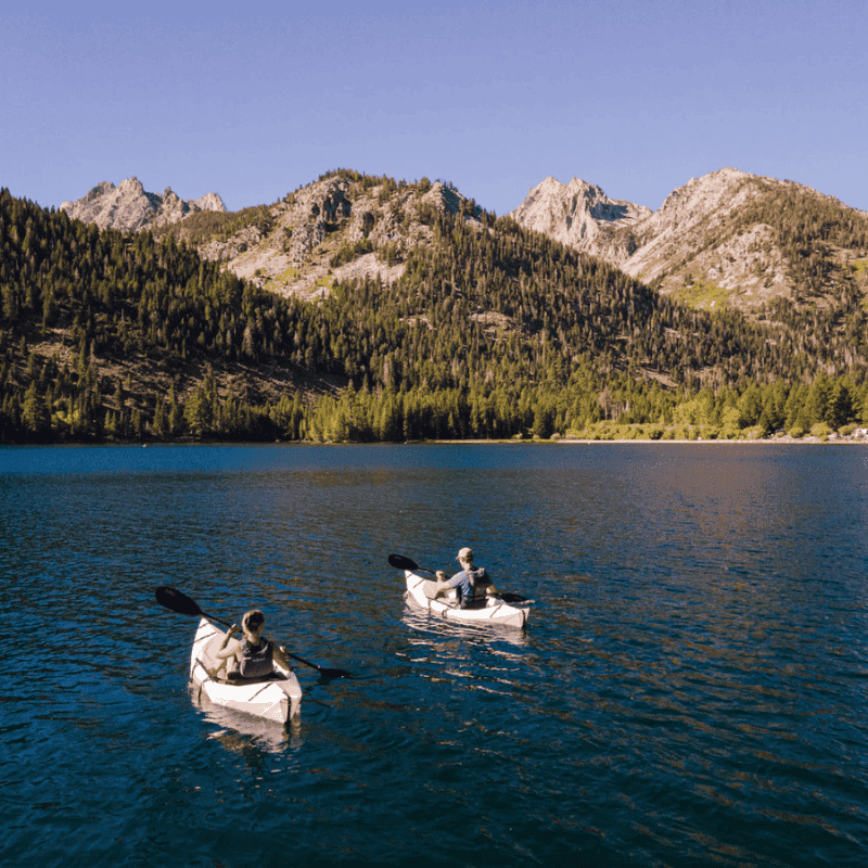 Paddling the Oru Lake + at sunset with a scenic mountain backdrop