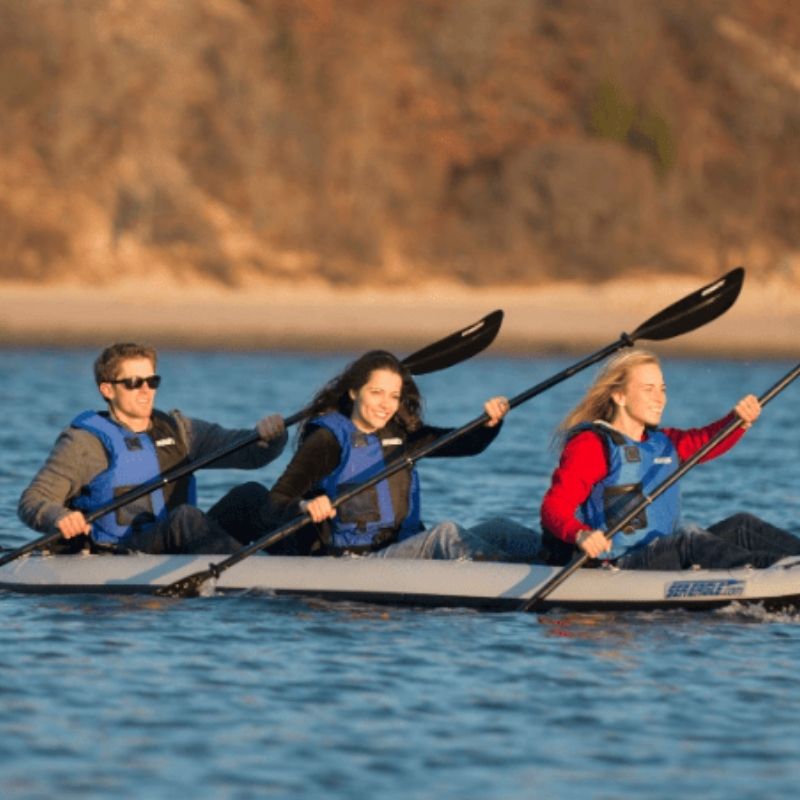 Group paddling in the Sea Eagle 465ft FastTrack inflatable kayak on open water