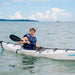 Man kayaking solo with the Terravent K1 Folding Kayak on a calm sea