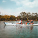 Two kayakers in a Terravent K3 Folding Kayak paddling on a peaceful evening lake